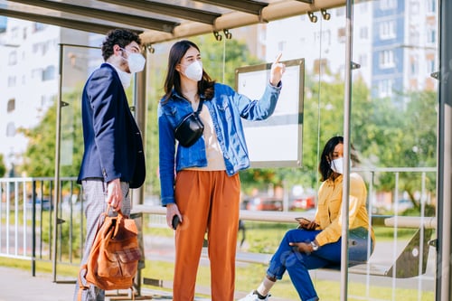 Preview: Young man tourist asking for help in tram stop outdoor.