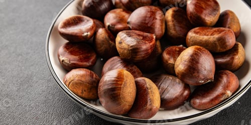 Preview: Edible chestnuts delicious treat tasty snack fresh gourmet food background on table