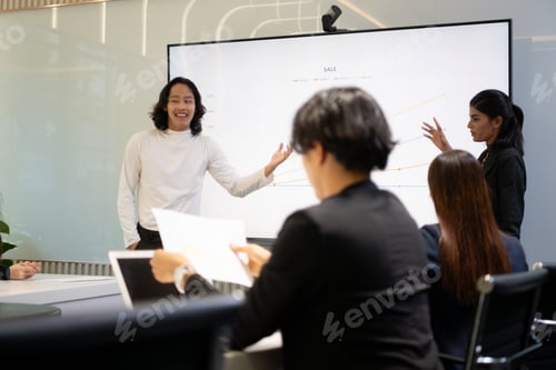 Preview: Business people having a meeting and present in a conference room at the office.