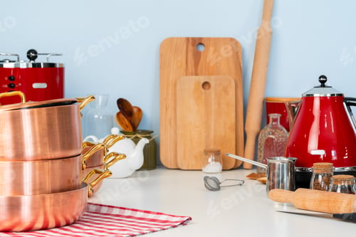 Preview: Kitchen utensils on a modern home kitchen table top