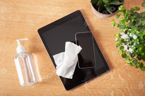 Preview: disinfecting tablet computer and smartphone screen, eliminating germs coronavirus bacteria