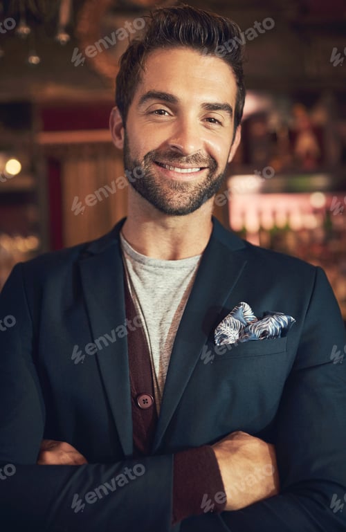 Preview: The life of a bachelor. Cropped portrait of a young man standing in a bar.