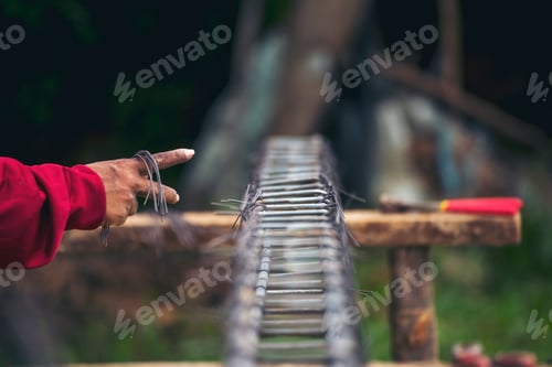 Preview: Construction Worker hands using Welding machinery iron metal sparking. Men hands protective glove