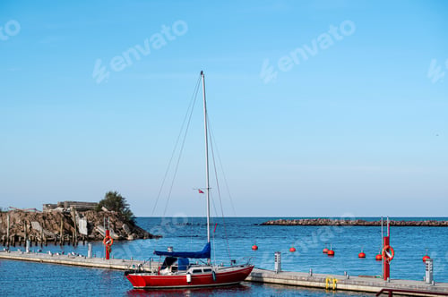 Preview: Yacht at a wooden platform in the port of Engure on the coast of the Baltic Sea