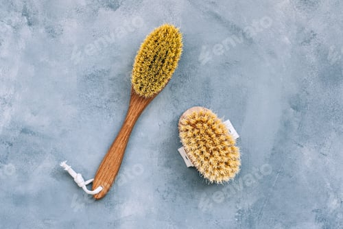 Preview: Wooden brushes for dry body massage isolated on blue background.