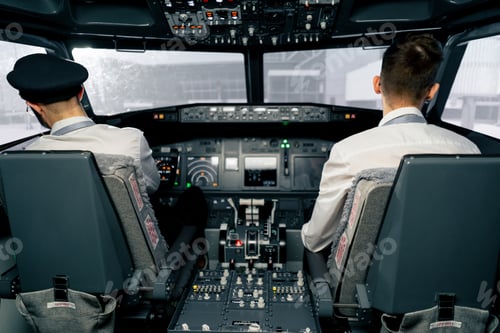 Preview: Airplane cabin Pilots check electronics by pressing buttons Passenger airliner preparation takeoff