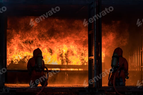 Preview: Firefighter Concept. Fireman using water and extinguisher to fighting with fire flame. firefighters
