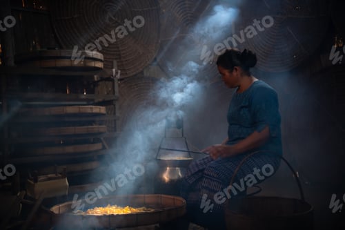 Preview: Silkworms are spun into threads by village women. the silk thread is wound into the tube