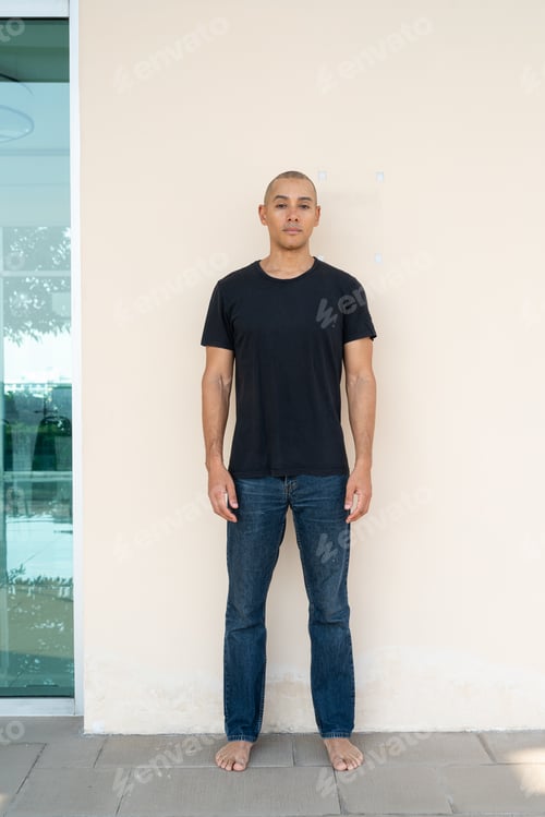 Preview: Portrait of handsome bald man wearing t-shirt