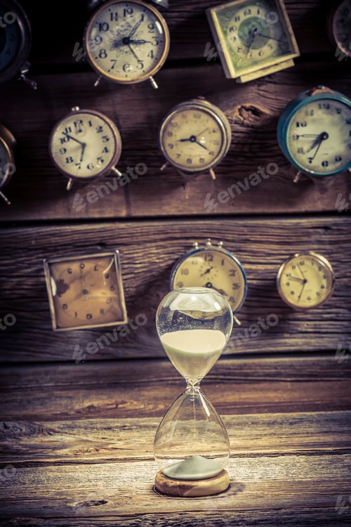 Preview: Hourglass as the old way of timing on clocks backgrounds