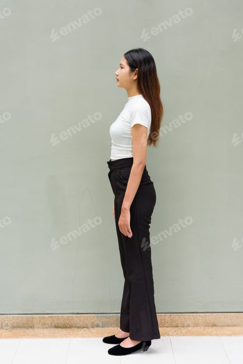 Preview: Portrait of young Asian woman standing