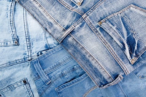 Preview: Jean background. Denim blue jean texture. Concept for fashion. Copy space. Frame .