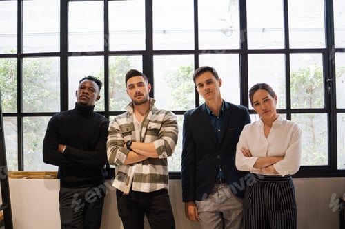 Preview: Business Team Standing Near a Window