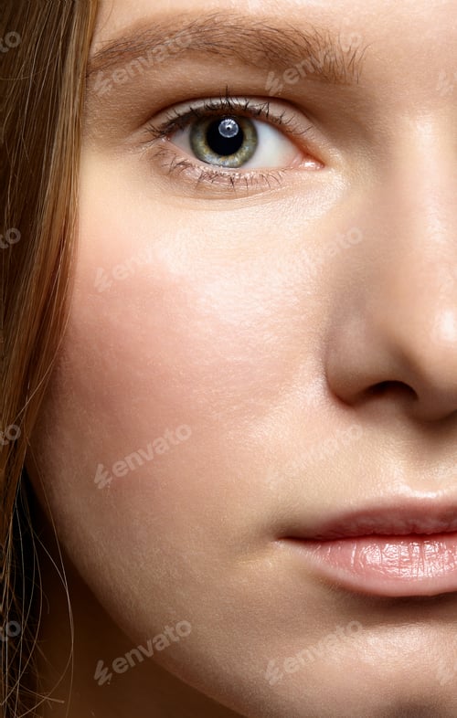 Preview: Closeup Macro Shot Of Human Female Face. Woman With Natural Face And Eyes Beauty Makeup.