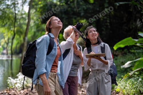 Preview: Backpack tourist travel outdoor adventure bird study using binoculars looking and record to book