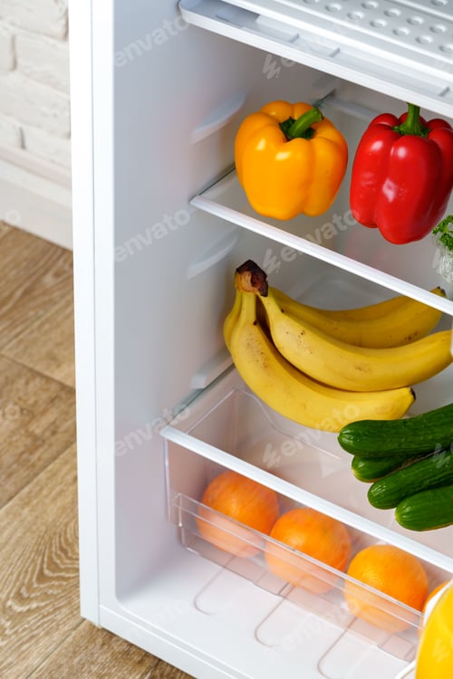 Preview: Open Refrigerator Door Showing Fresh Produce Inside