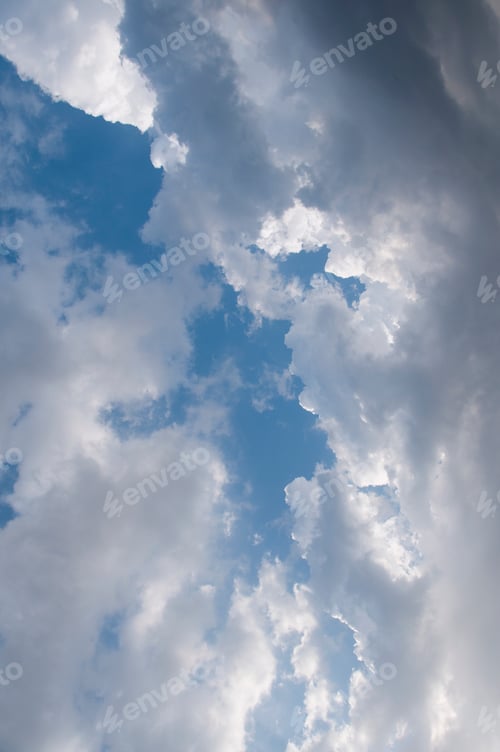 Preview: Natural daylight and white clouds floating on blue sky