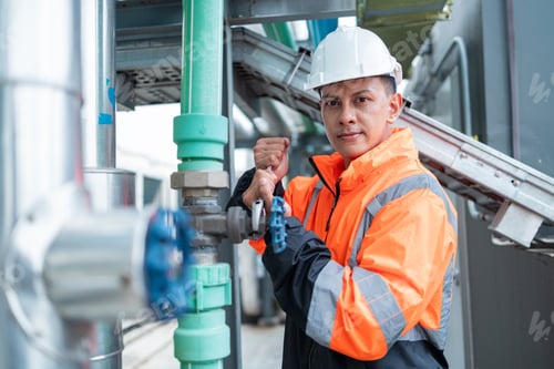 Preview: The engineer checks and adjusts the valve to allow the amount of water to flow through
