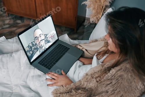 Preview: Close-up of a girl making a video call with her personal doctor