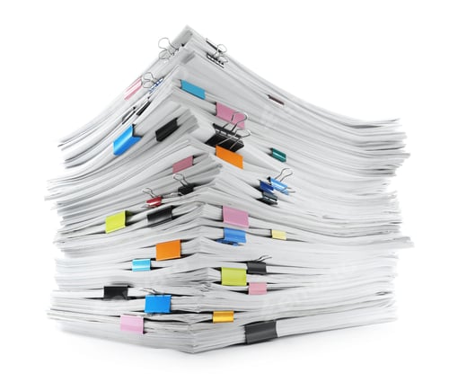 Preview: Stack of documents with colorful binder clips on white background