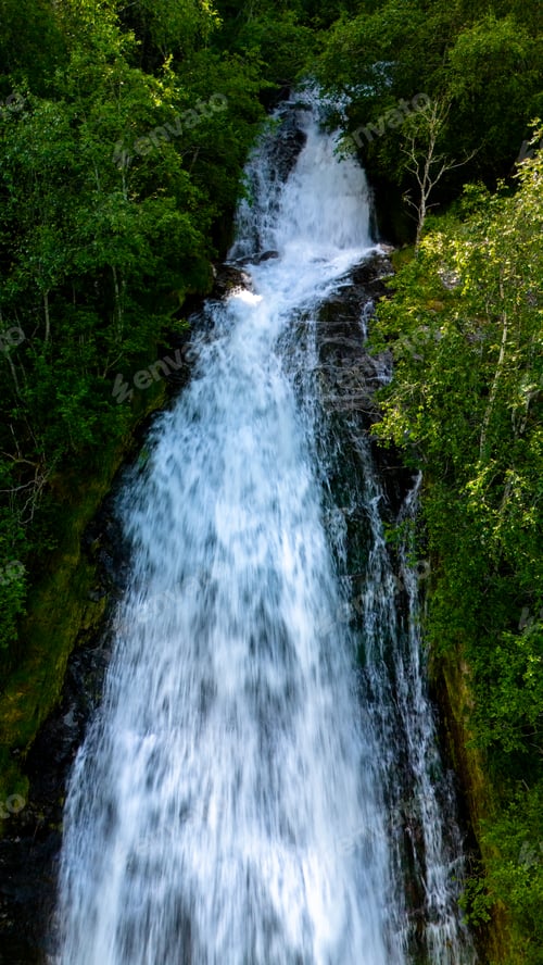 Preview: Cascading Beauty: A Waterfall in Norway, Fjaerlandsfjorden, Fjord, Vestland, Norway