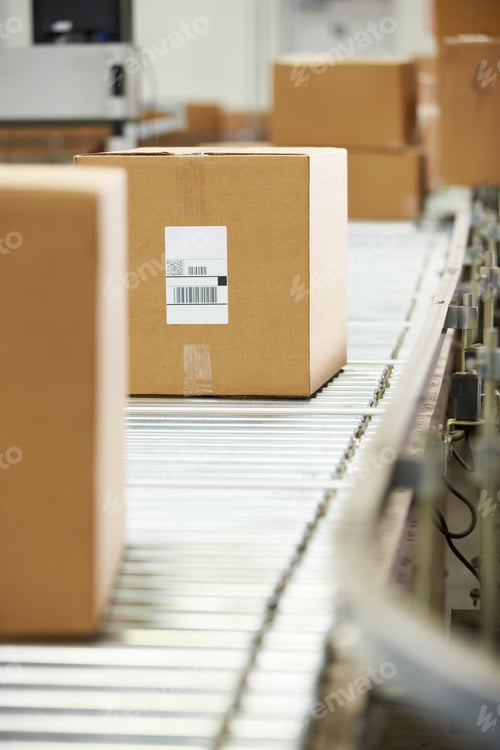 Preview: Goods On Conveyor Belt In Distribution Warehouse