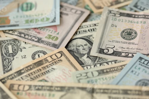 Preview: Stack of dollar bills. Hundred, fifty, twenty, ten, five dollars banknote close up