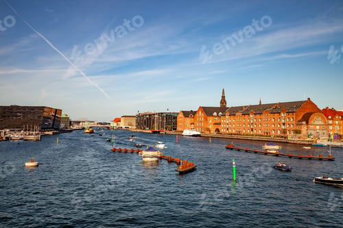 Preview: COPENHAGEN, DENMARK - MAY 6, 2018: aerial view of cityscape with river and boats