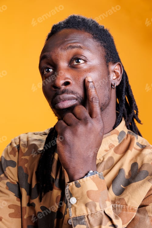 Preview: Thoughtful man thinking at business ideas