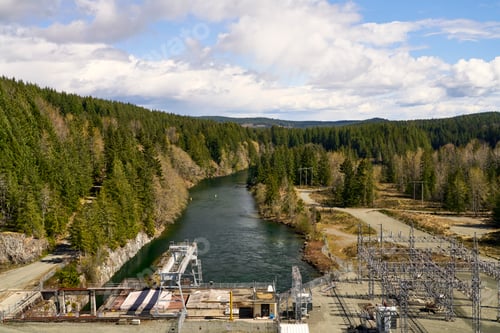 Preview: BC Hydro Strathcona Dam looking down at the visible infrastructure and the Campbell River,