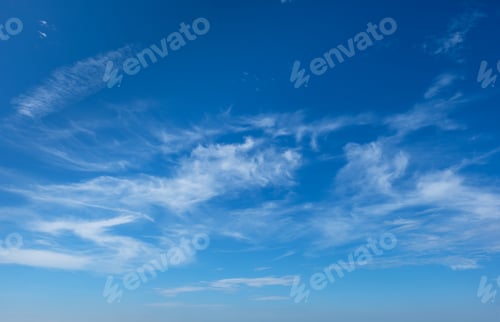 Preview: Clear Blue Sky with Wispy Clouds on a Sunny Day