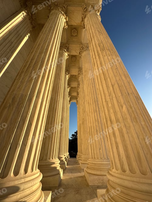Preview: Low-angle shot of the big columns of the Supreme Court of the United States on a sunny day