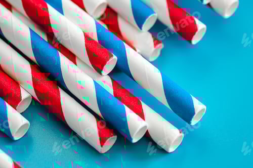 Preview: Drinking straws for party on blue background, close up.