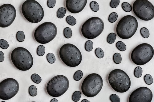 Preview: Flatlay of hot spa massage stones
