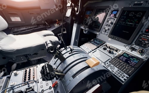 Preview: Knobs and buttons. Close up focused view of airplane cockpit