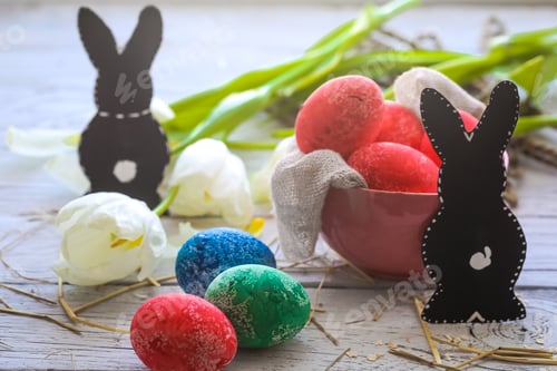 Preview: Easter still life with colored eggs and rabbit