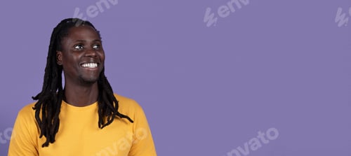Preview: Excited black guy looking at copy space for advert