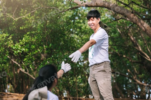 Preview: Asian volunteer help concept,show teamwork spirit togetherness, giving a helping hand to people.
