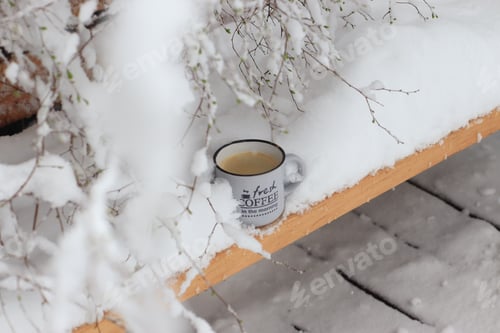 Preview: Snowy Coffee Cup on Wooden Decking