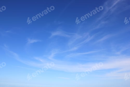 Preview: Whispy clouds against a blue sky
