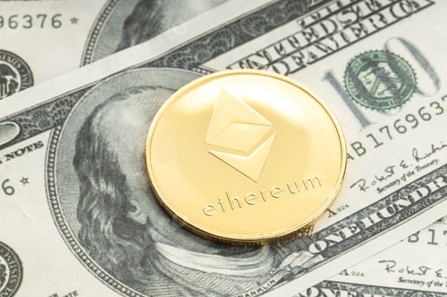 Preview: Ethereum coin on dollar banknotes