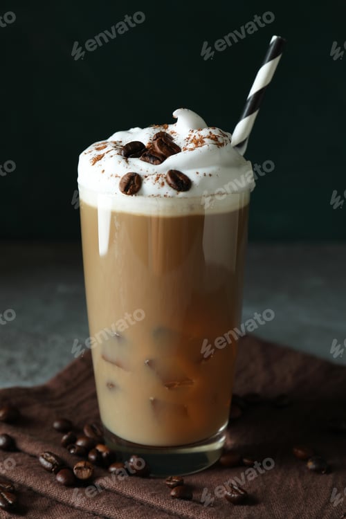 Preview: Concept of delicious drink with ice coffee on gray textured table