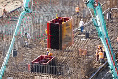 Preview: workers working with concrete irons in a construction site