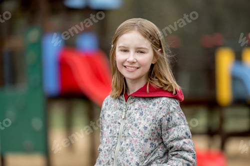 Preview: Portrait of beautiful little girl on the playground