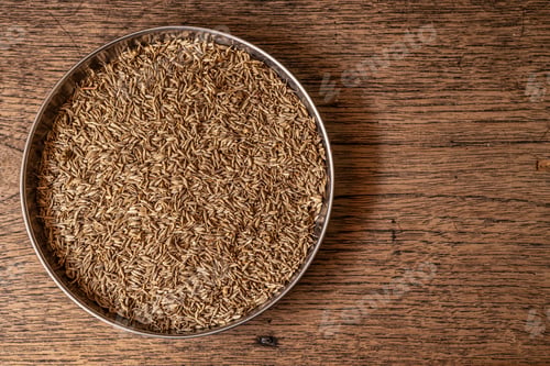 Preview: Cumin seed dry from tree basil indian food aroma isolated on wood background