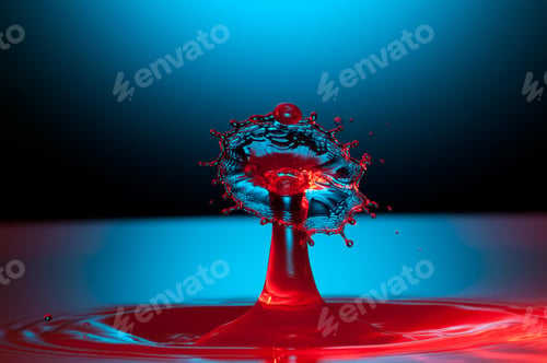 Preview: Splash of colorful liquid with high speed flash