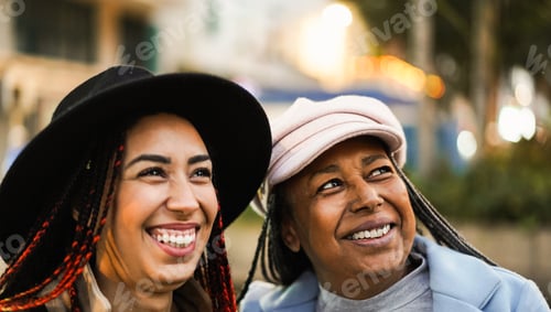 Preview: African mother and daughter having fun together during winter time outdoor