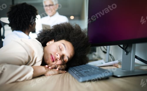 Preview: Overworked and tired businesswoman sleeping at work