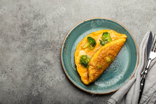 Preview: Healthy omelette with broccoli on plate top view