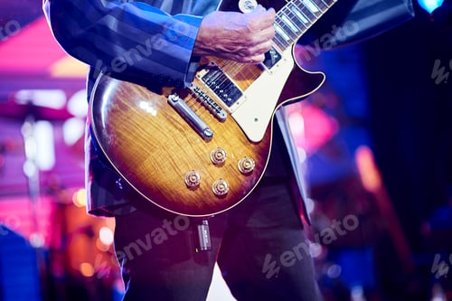 Preview: Performer Playing Vintage Electric Guitar on Stage